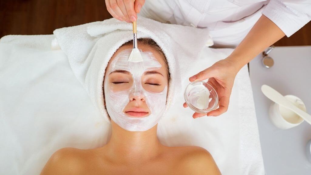 woman apply korean glass skin multivitamin mask in procedure