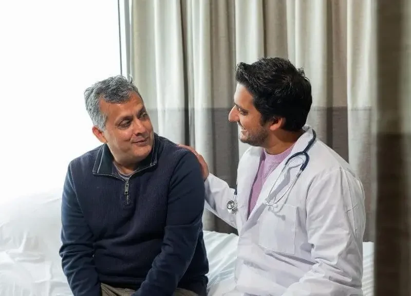 Doctor consulting a patient about erectile dysfunction and health