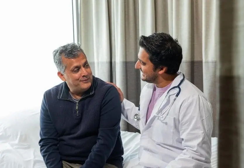 Doctor consulting a patient about erectile dysfunction and health