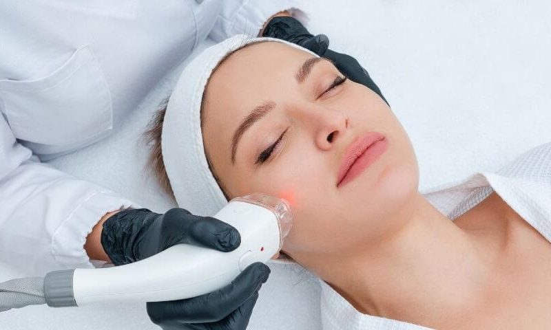 Woman receiving HIFU for V shape face treatment contouring