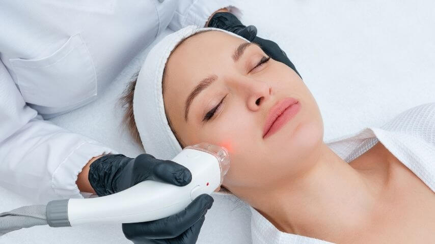 Woman receiving HIFU for V shape face treatment contouring